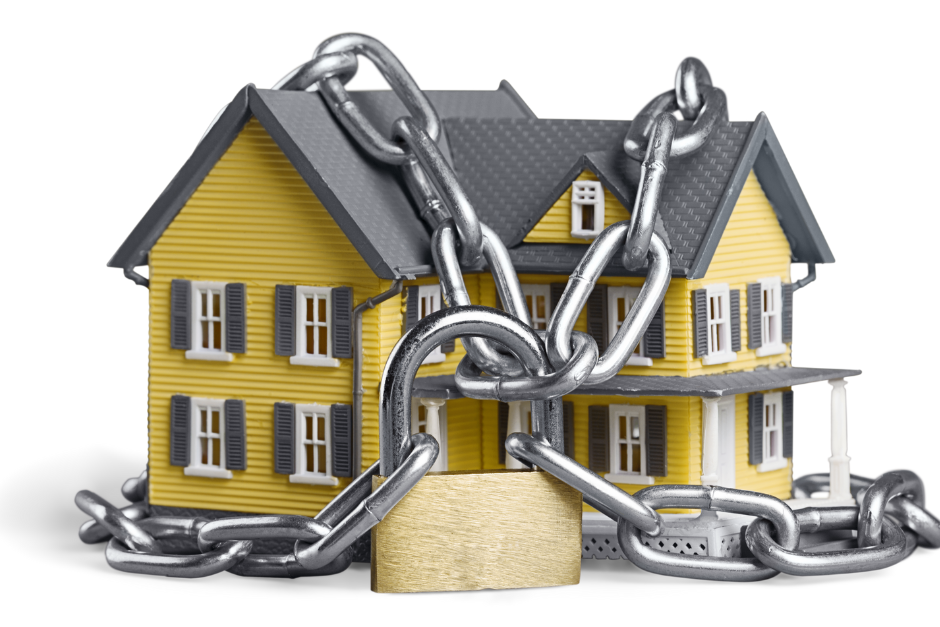 House under chain and lock being protected from title fraud